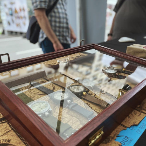 Close up of a display case for watches at a tradeshow. 