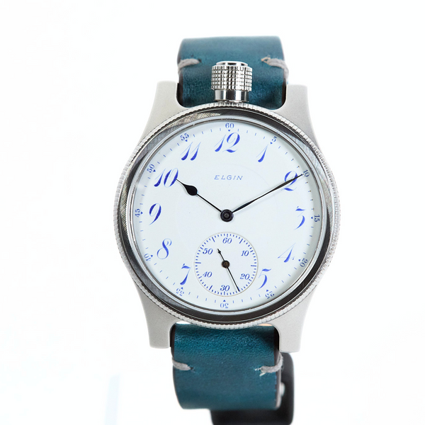 Wristwatch with blue strap and white face on a white background
