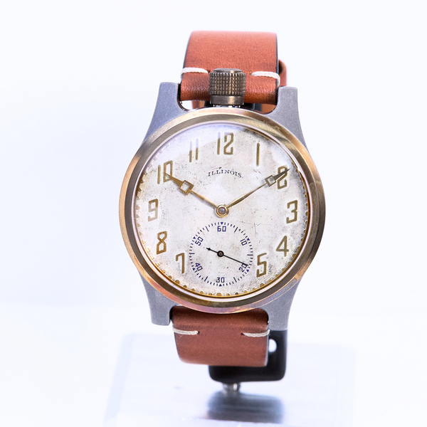 Watch with a brown strap on a white background