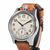 Watch with brown leather strap and silver case on white background