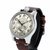Watch with a detailed face and brown leather strap on a white background