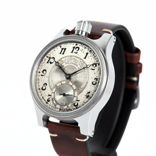Watch with a detailed face and brown leather strap on a white background