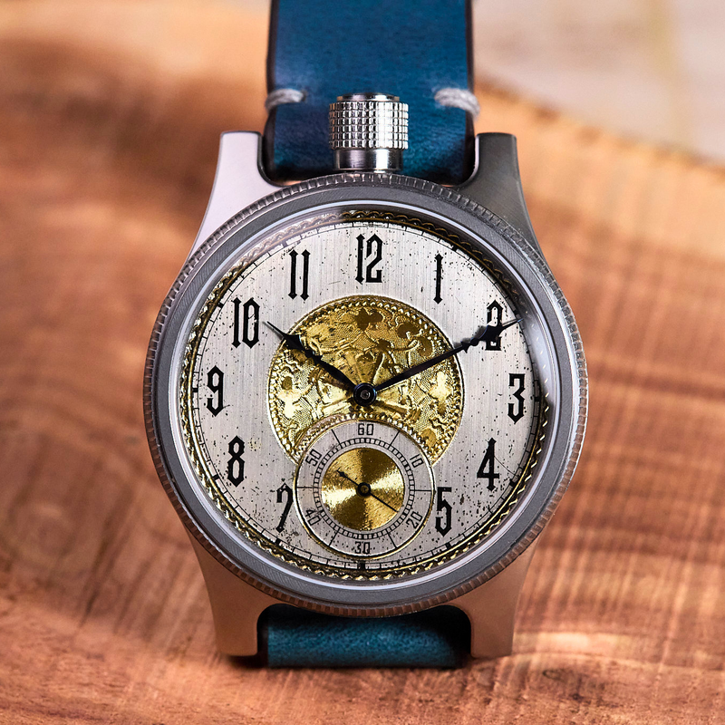 Watch with a detailed face on a wooden surface